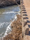 Flotsam at a low-water bridge