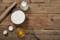 Flour in a bowl with ingredients for preparing baked products Royalty Free Stock Photo