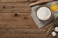 Flour in a bowl with ingredients for preparing baked products Royalty Free Stock Photo