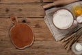 Flour in a bowl with ingredients for preparing baked products Royalty Free Stock Photo