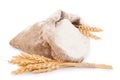 Flour in burlap bag with wheat ears