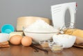 Flour, dairy products, eggs, spices and mixer Royalty Free Stock Photo