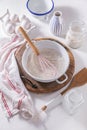 Flour and egg with baking ingredients and kitchen utensils Royalty Free Stock Photo
