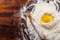 Flour, egg and rolling pin with copy space Royalty Free Stock Photo