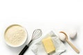 Flour, eggs, butter, whisk, spoon isolated on white background Royalty Free Stock Photo