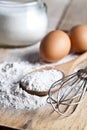 Flour, eggs and kitchen utensil Royalty Free Stock Photo