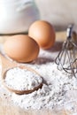 Flour, eggs and kitchen utensil Royalty Free Stock Photo