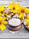 Flour of Jerusalem artichoke in bowl on napkin