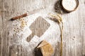 Flour powder and bakery on wooden table Royalty Free Stock Photo