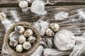 Flour and quail eggs. Ingredients for cooking. Wooden table. To