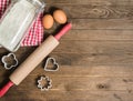 Flour, rolling pin, eggs and moulds Royalty Free Stock Photo