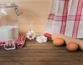 Flour, rolling pin, eggs and moulds Royalty Free Stock Photo