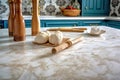 flour and rolling pin on a marble countertop Royalty Free Stock Photo