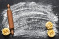 Flour and rolling pin on the table. The process of cooking tagliatelle pasta on the kitchen table Royalty Free Stock Photo