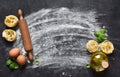 Flour and rolling pin on the table. The process of cooking tagliatelle pasta on the kitchen table Royalty Free Stock Photo