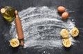 Flour and rolling pin on the table. The process of cooking tagliatelle pasta on the kitchen table Royalty Free Stock Photo