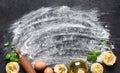 Flour and rolling pin on the table. The process of cooking tagliatelle pasta on the kitchen table Royalty Free Stock Photo
