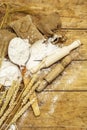 Flour in sacks, ears of grain, spoons and wooden rolling pins Royalty Free Stock Photo