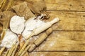 Flour in sacks, ears of grain, spoons and wooden rolling pins Royalty Free Stock Photo