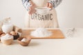 Flour sifting through a sieve for a baking Royalty Free Stock Photo