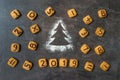 Flour Silhouette Christmas Tree with cookies digits 2019 on dark