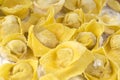 Flouring tortellini ready to cook