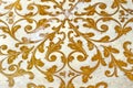Gold flourish design ornament. Decorative white background.