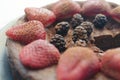 Flourless chocolate cake with berries closeup