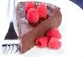 Flourless chocolate cake with raspberries Royalty Free Stock Photo