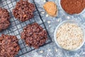 Flourless no bake peanut butter and oatmeal chocolate cookies on cooling rack, horizontal, top view