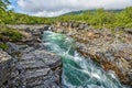 The Flow Of Abiskojokk River Through The Rocky Canyon In Abisko National Park In Northern Sweden