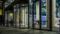The flow of people passing through the revolving door of the modern office building at the end of the working day
