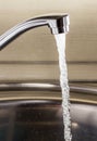 The flow of water from the tap Royalty Free Stock Photo