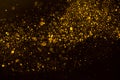 Flow wave of golden glitter dust shiny sparkle bokeh abstract texture Royalty Free Stock Photo