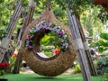 Flower arch for sitting in the garden at coffee shop called `Cafe amatis`, Uttaradit, Thailand