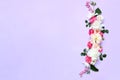 Flower arrangement of Alstroemeria, eustoma, roses, Dycenter on a pink-purple background.