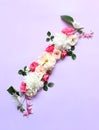 Flower arrangement of Alstroemeria, eustoma, roses, Dycenter on a pink-purple background.