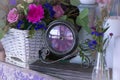 Flower arrangement in a basket decorate the wedding table in purple tones. Vintage. Royalty Free Stock Photo