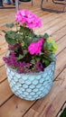 Flower arrangement in blue pot