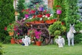 Flower arrangement in the garden of Monastery Bujoreni, landmark attraction in Romania. Spring landscape Royalty Free Stock Photo