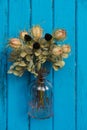 Flower arrangement with nigella on wooden background Royalty Free Stock Photo