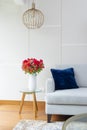 Flower arrangement of red roses in a nice living room