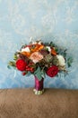 Flower arrangement for a wedding party. The bouquet of pink roses, red peonies and other flowers. Wedding. Artwork Royalty Free Stock Photo