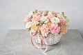 Flower arrangement in Wicker basket. Beautiful bouquet of mixed flowers. Handsome fresh bouquet. Small flower shop and