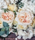 Flower arrangement on wooden background Royalty Free Stock Photo