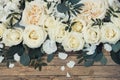 Flower arrangement on wooden background Royalty Free Stock Photo