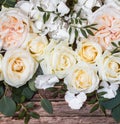 Flower arrangement on wooden background Royalty Free Stock Photo