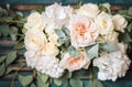 Flower arrangement on wooden background Royalty Free Stock Photo