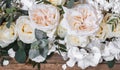 Flower arrangement on wooden background Royalty Free Stock Photo