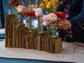 Flower Arranging with cardboard and glass Royalty Free Stock Photo